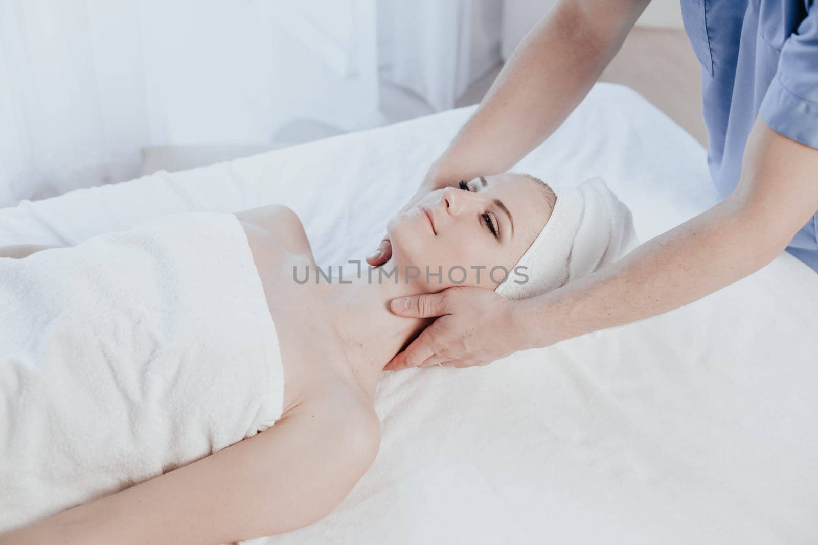 beautiful girl make massage therapy neck in Spa 1