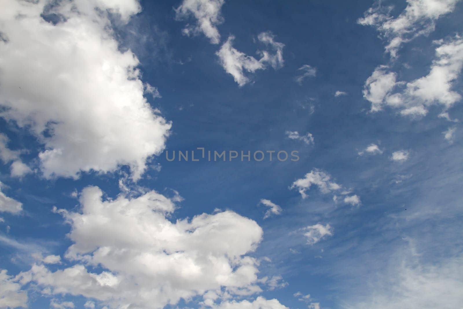 Beautiful blue sky and clouds natural background by alex_nako