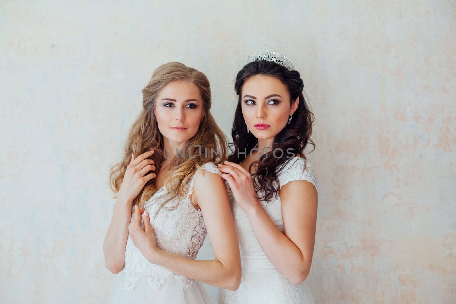 two girls in white dresses brunette and blonde by Simakov