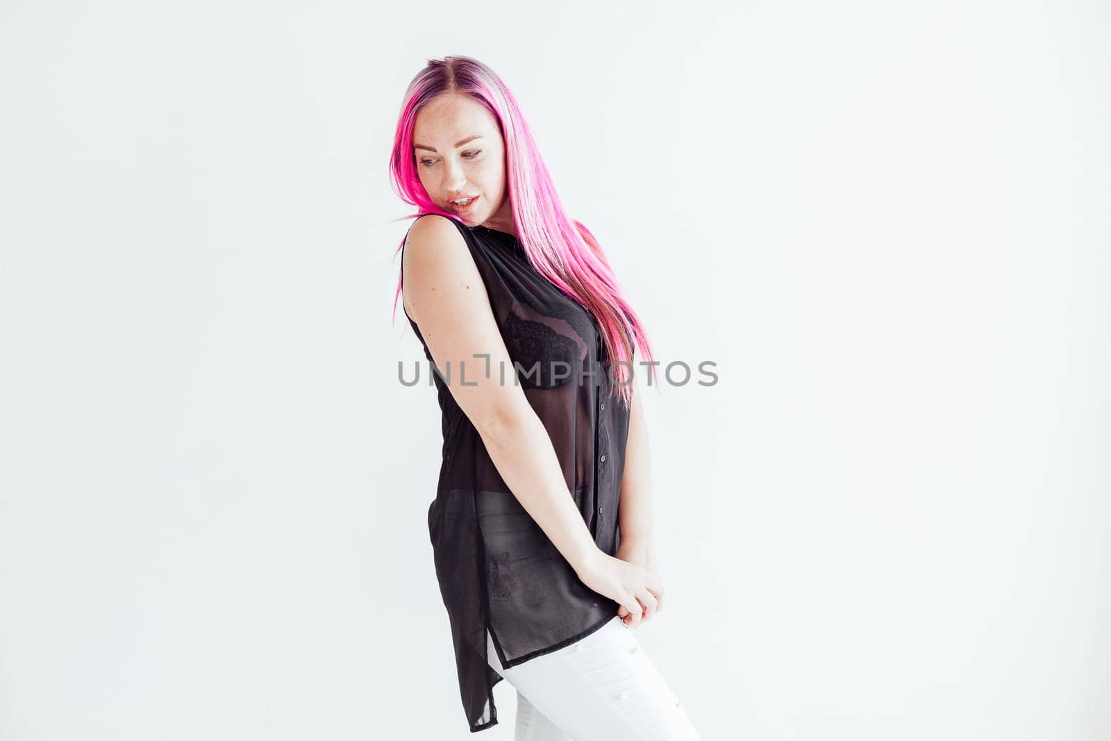 girl with pink hair sits in a Chair in a white room by Simakov