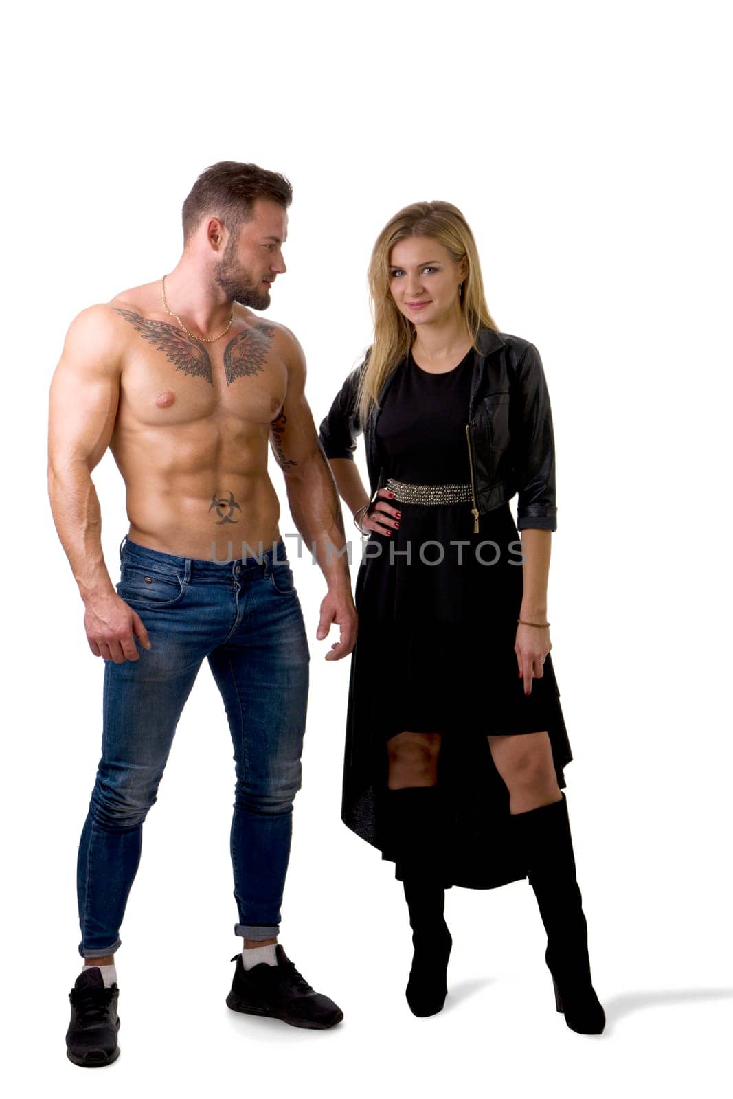 Shirtless, fit muscular man and beautiful blonde woman in studio by artofphoto