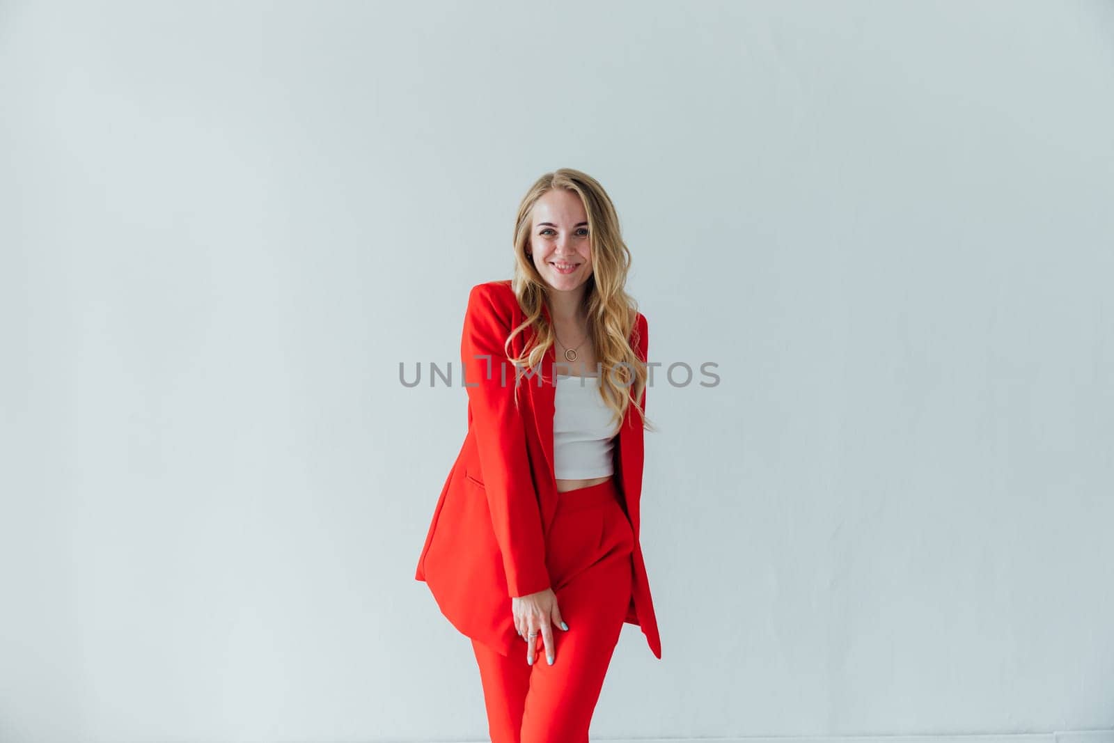 Beautiful woman in red business suit