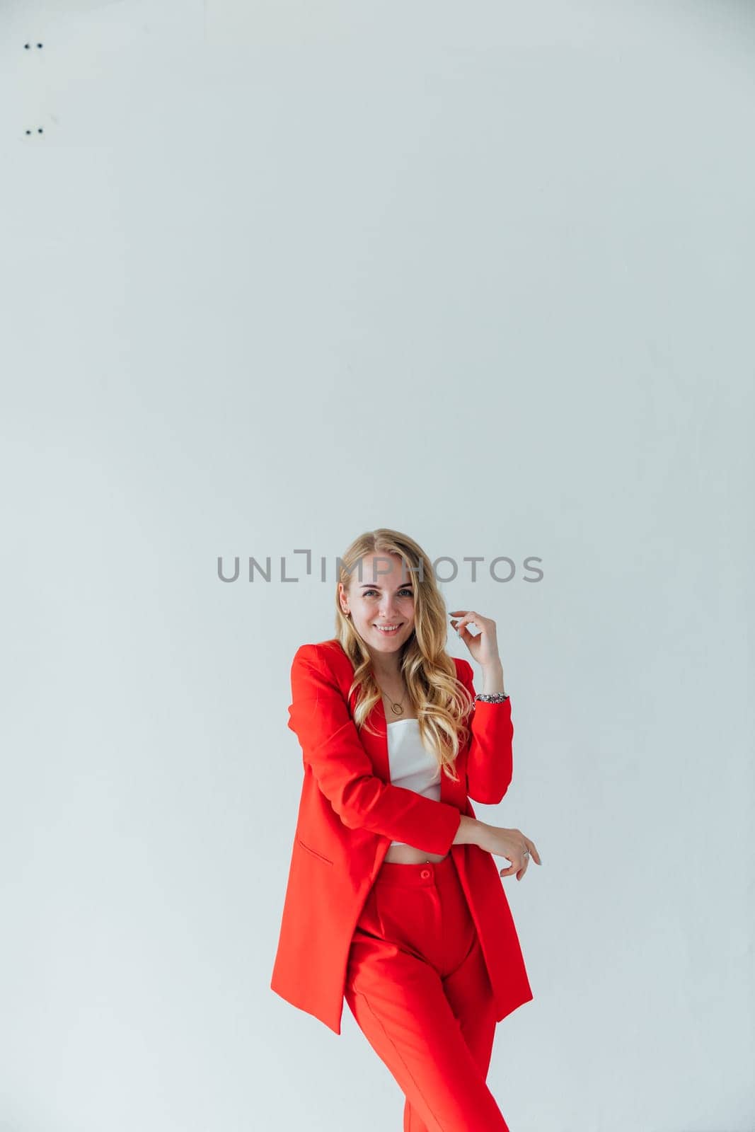 Beautiful woman in red business suit