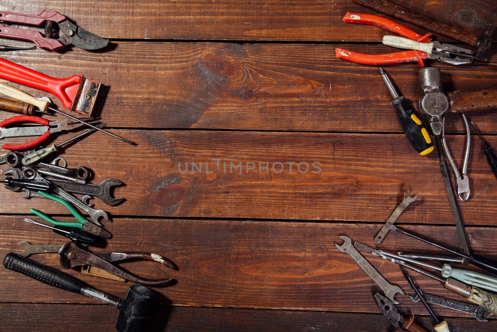 hammers screwdriver repair tool pliers on the boards by Simakov