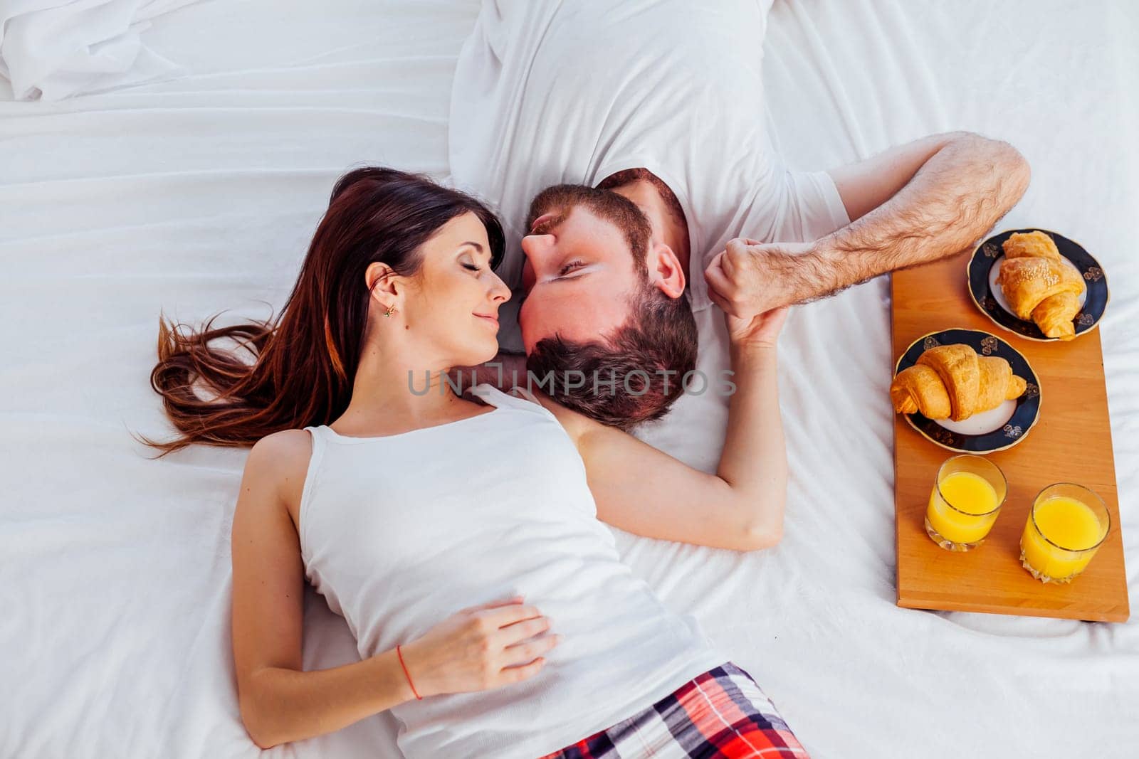 man and woman breakfast in bed nice