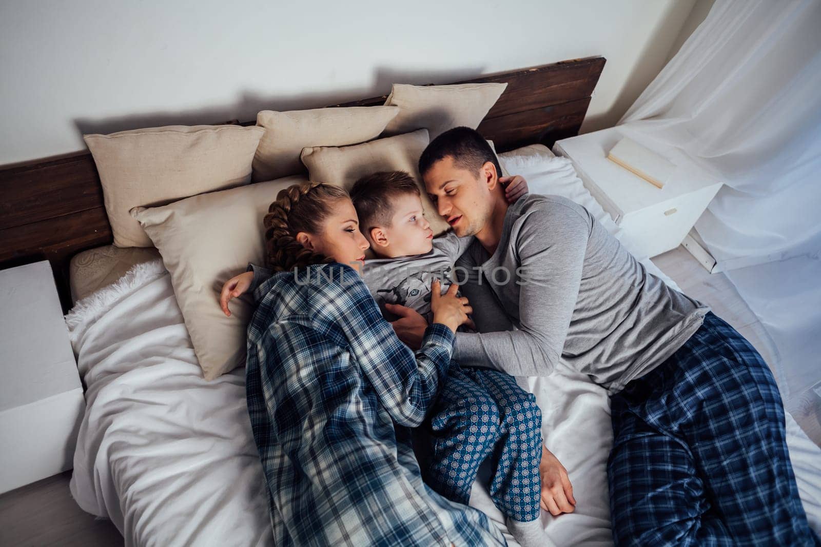 mom dad and son woke up in the morning
