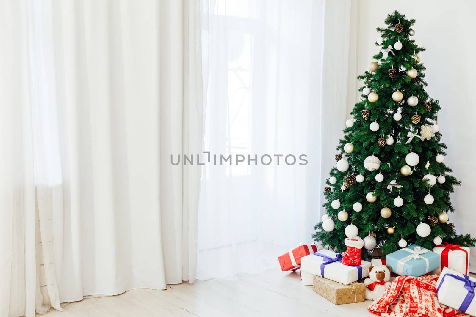 Christmas tree with gifts interior new year decor vintage holiday as background by Simakov