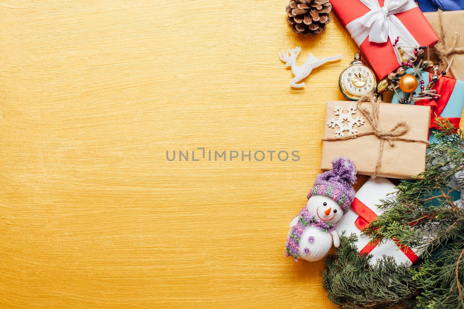 Christmas toys festive gifts decor new year on a golden background by Simakov