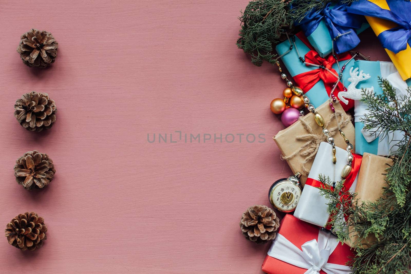 Christmas Toys Festive Gifts Dekor New Year on a pink background by Simakov