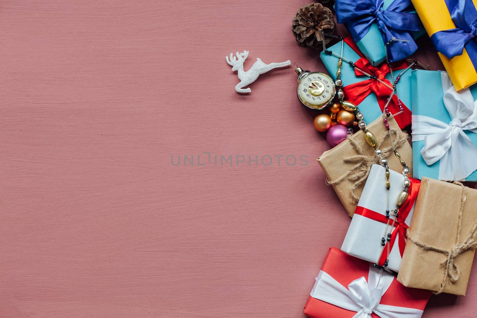 Christmas Toys Festive Gifts Dekor New Year on a pink background by Simakov