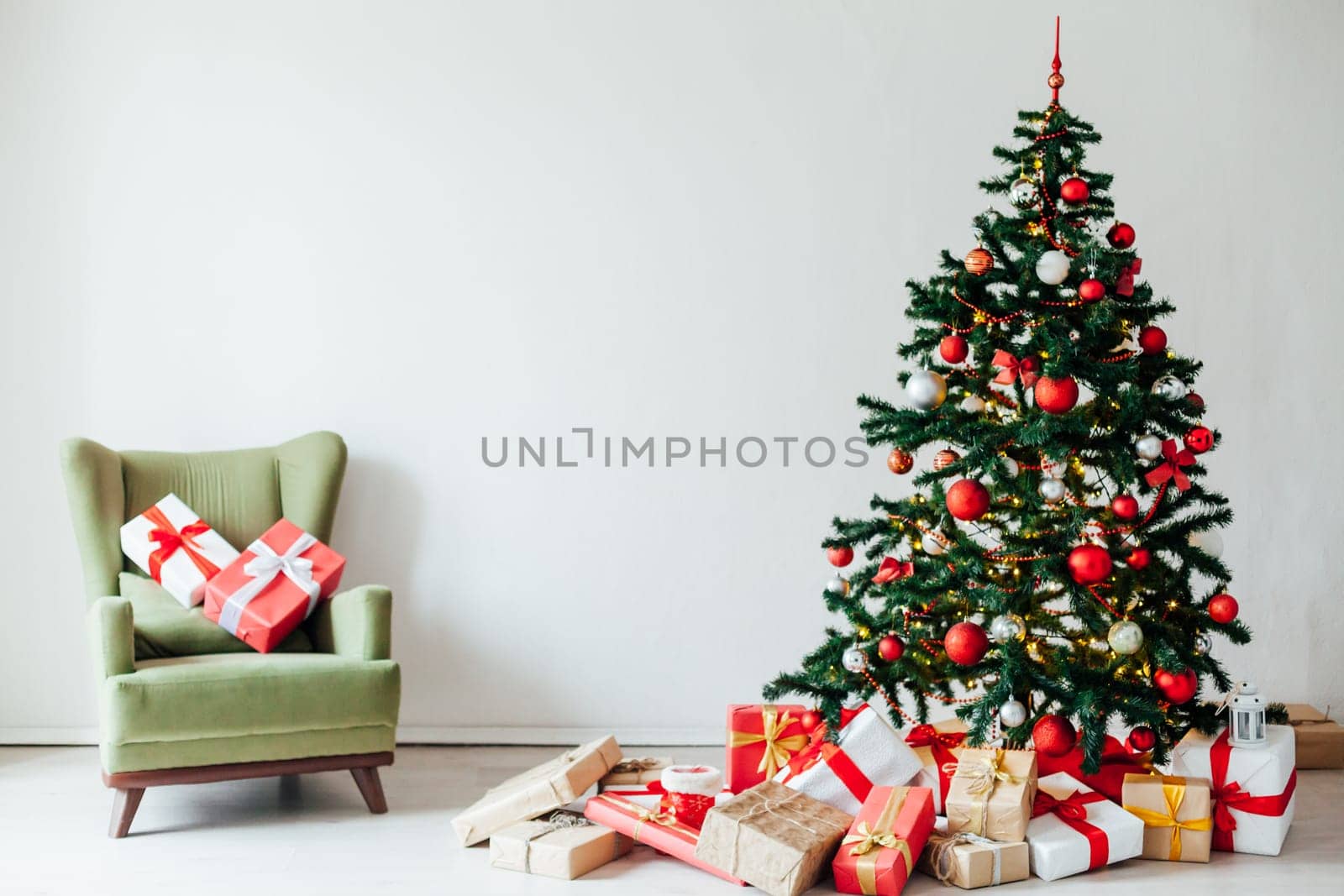 Christmas tree with gifts of red decor for the new year winter