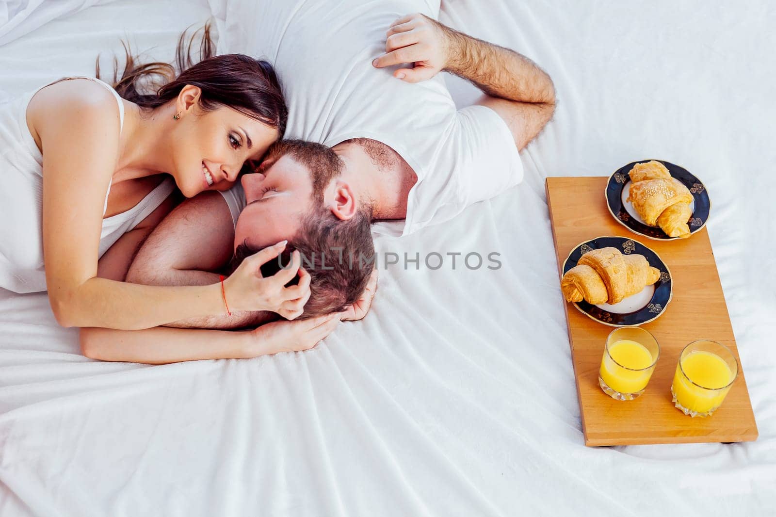 a man with a woman in the morning woke up to breakfast in bed 1
