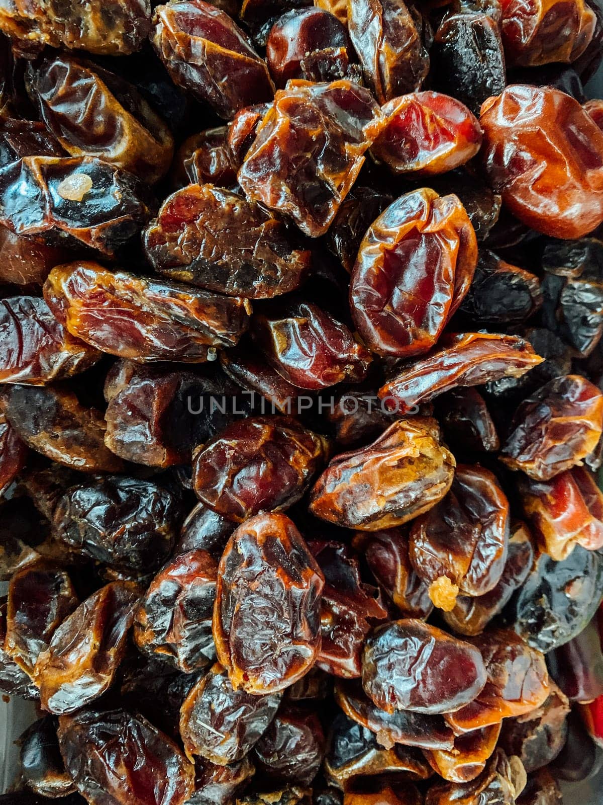 sweet dried fruit for eating as a background by Simakov