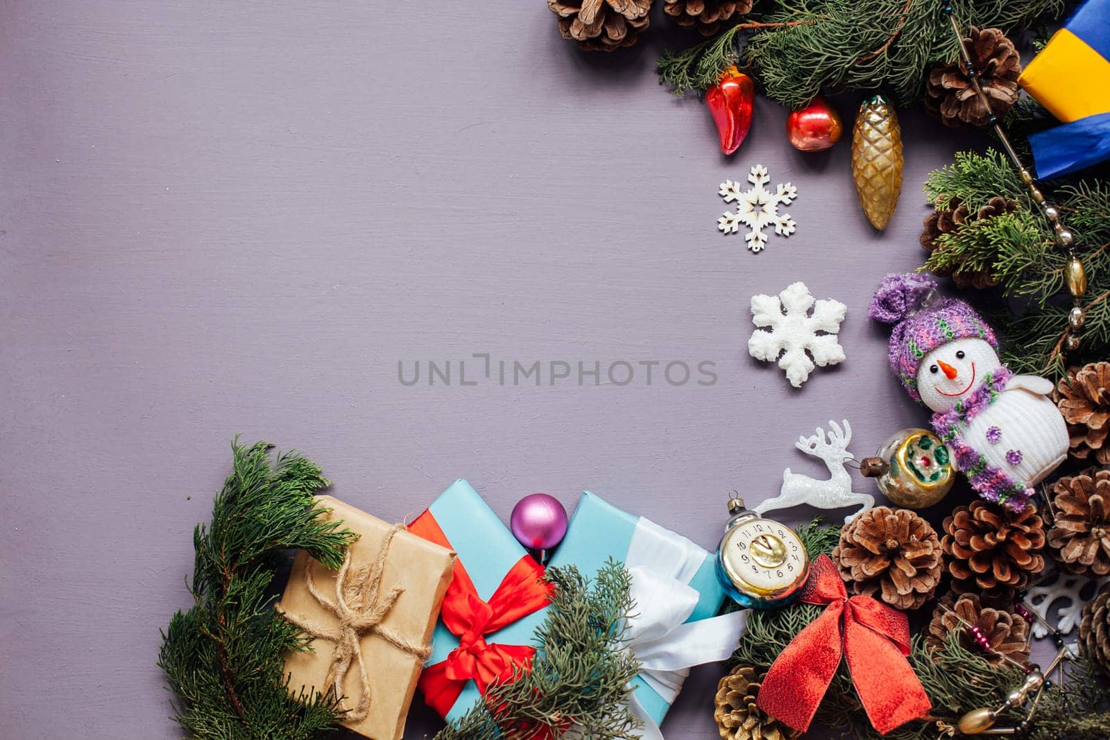 Christmas card gifts decor for the new year on a purple background by Simakov