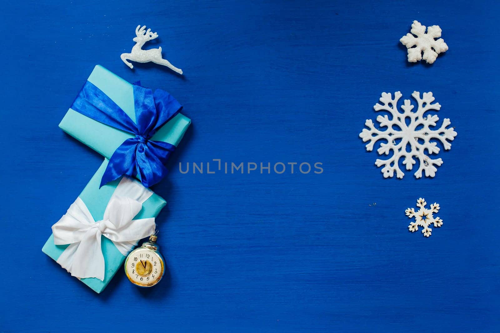 Christmas card gifts decor for the new year against a winter backdrop by Simakov