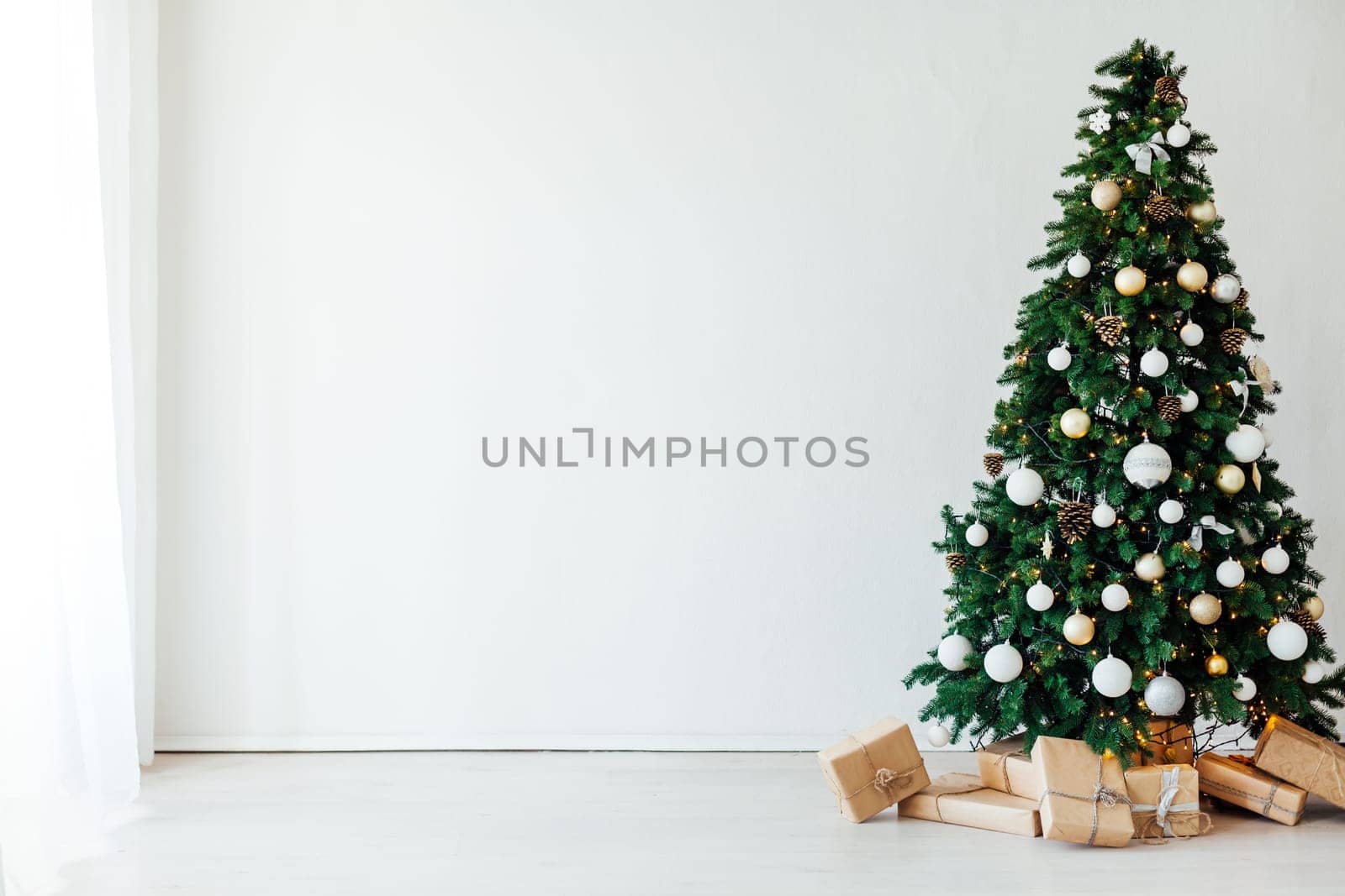 decor of the house with Christmas tree with gifts of the new year Thanksgiving holiday winter