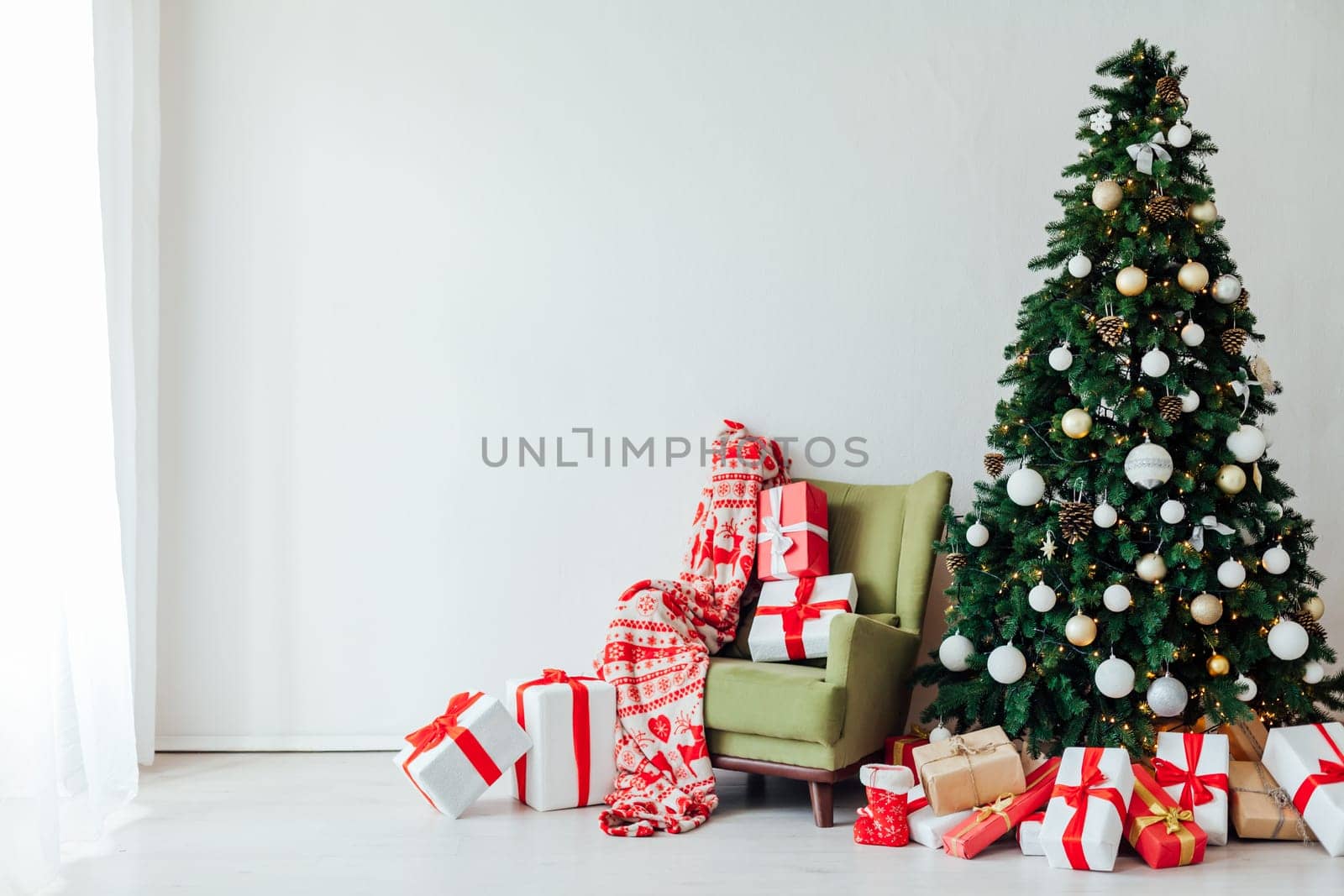 decor of the house with Christmas tree with gifts of the new year Thanksgiving holiday winter