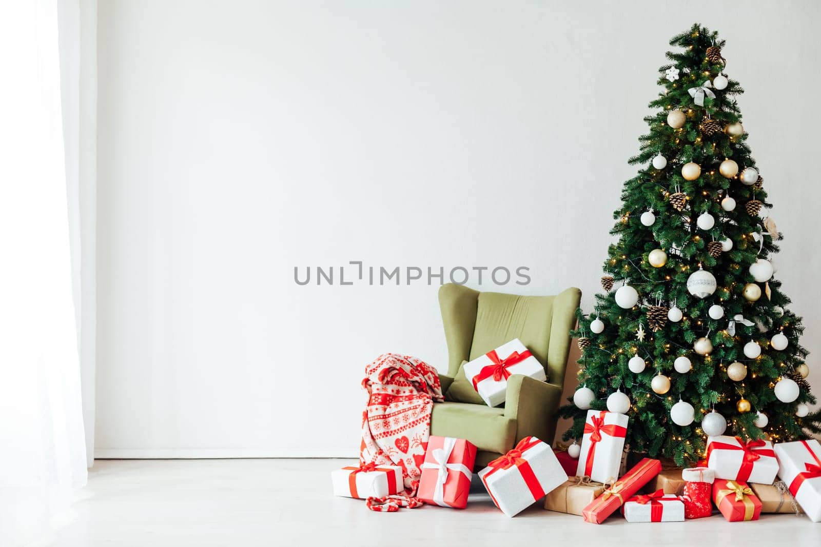 decor of the house with Christmas tree with gifts of the new year Thanksgiving holiday winter