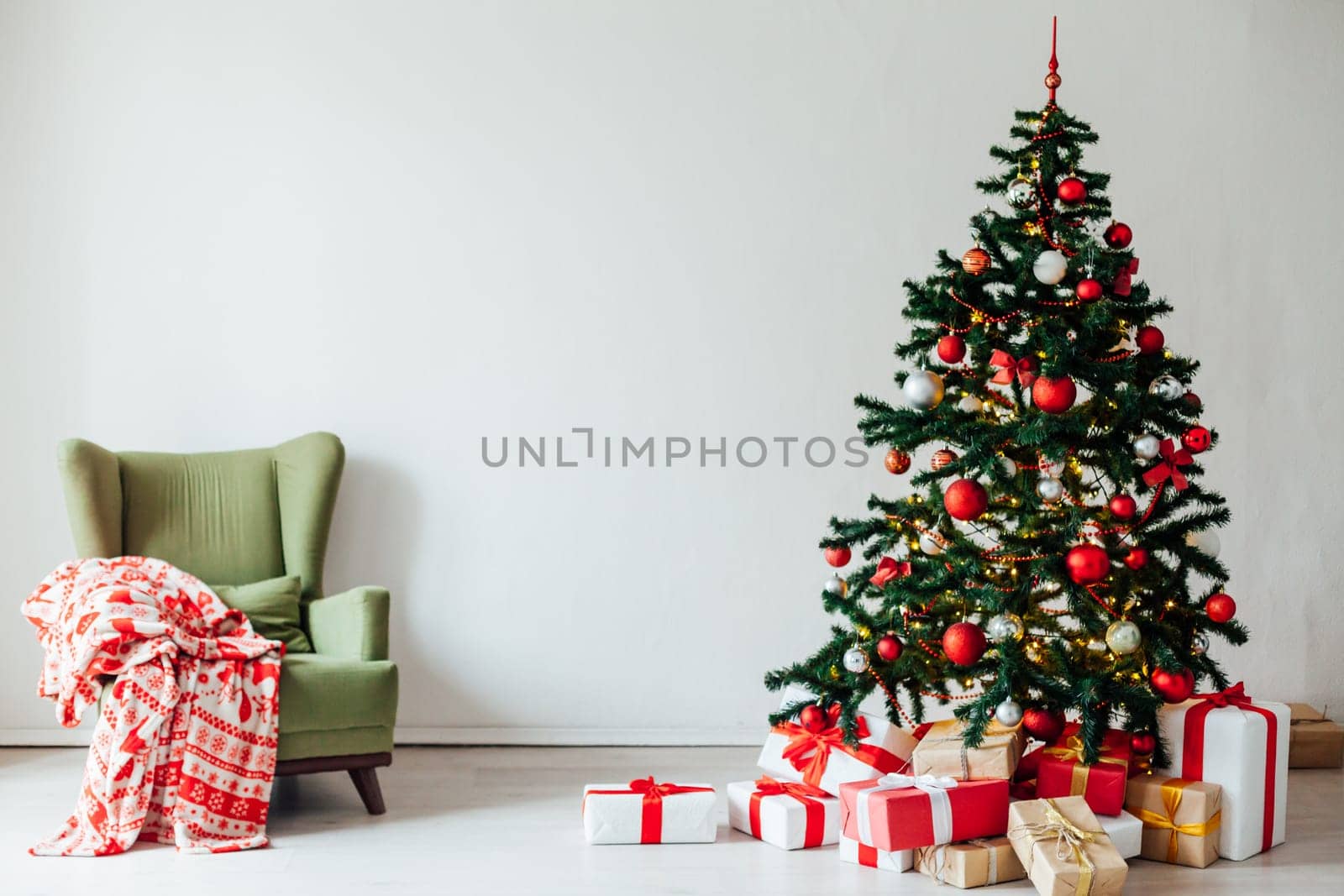 Christmas tree with red gifts decor interior for the new year by Simakov