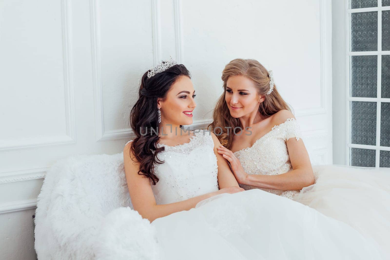 two brides on wedding wedding blonde brunette