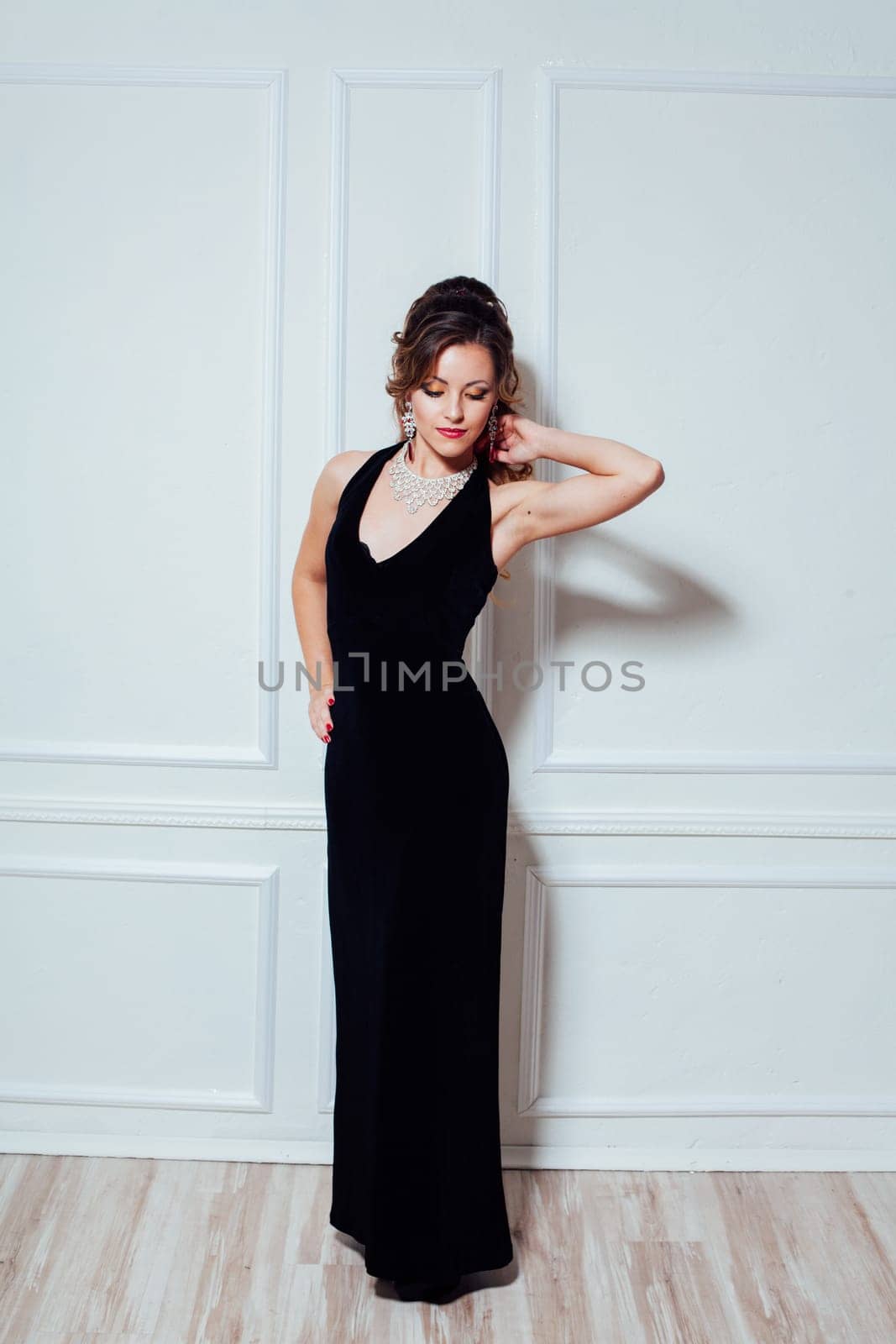 beautiful girl in black evening dress cocktail party 1