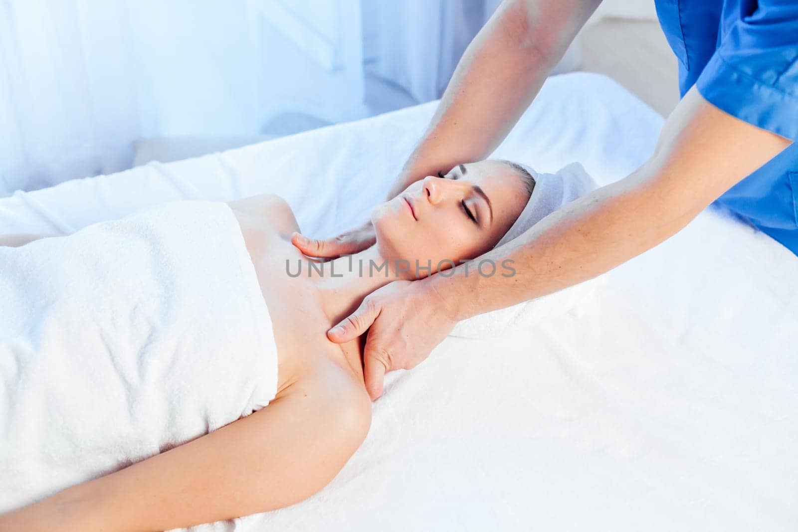 girl masseur doing massage neck face spa health 1