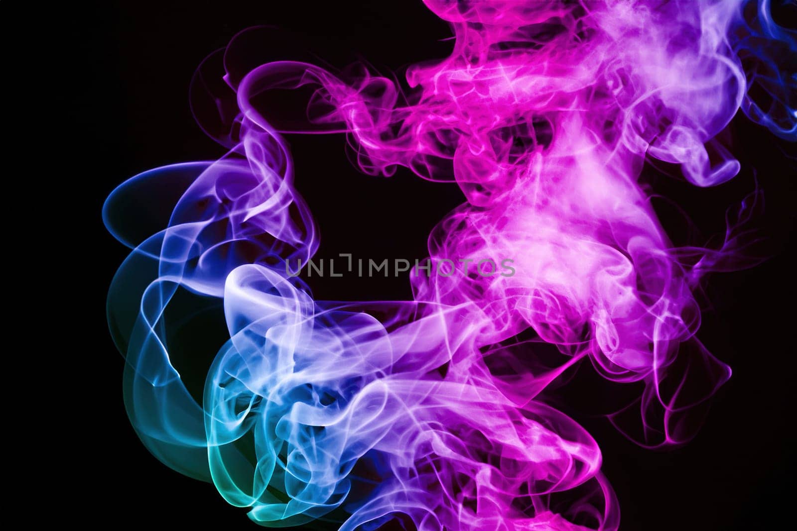 Abstract colorful smoke on black background.