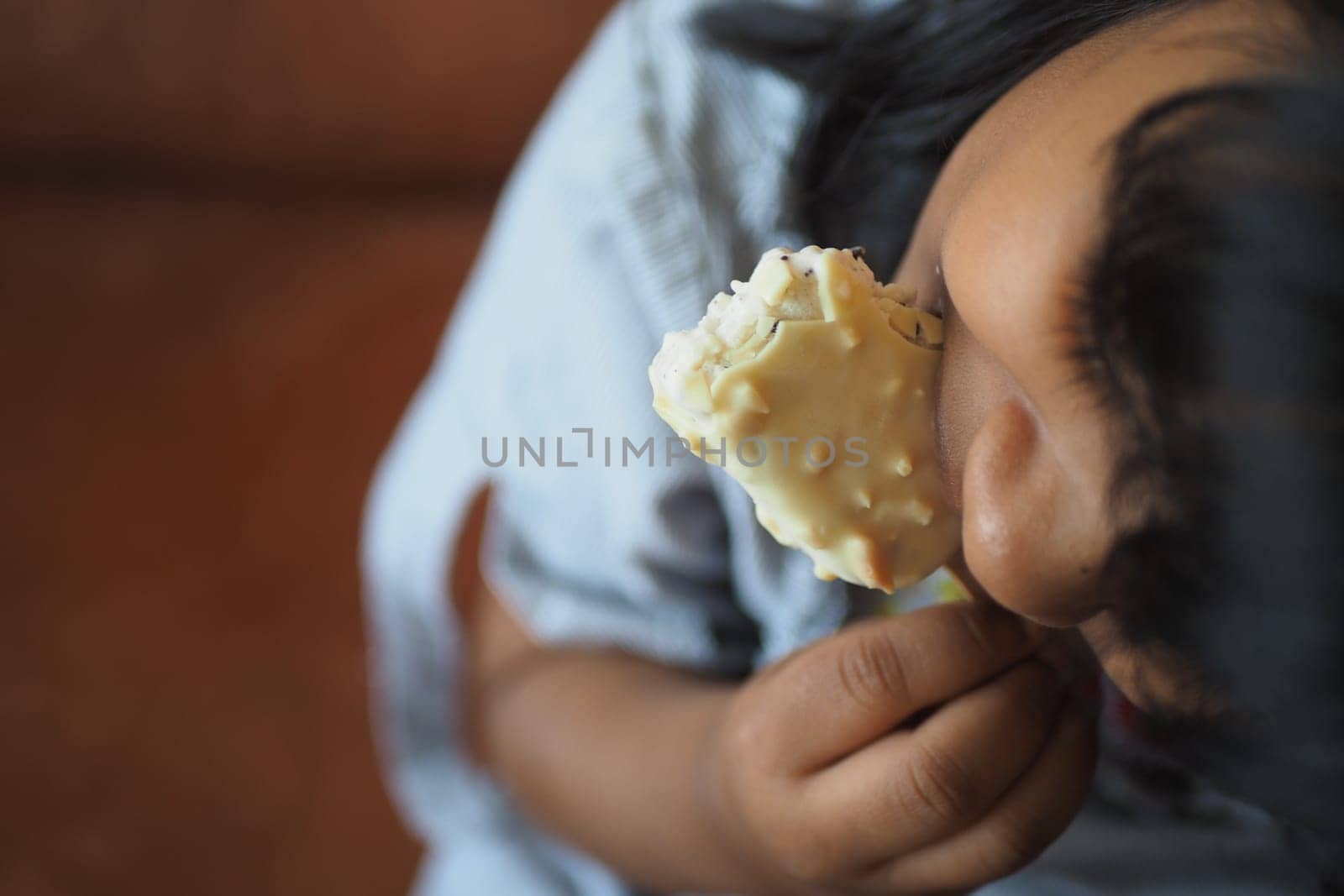 Child Hand Holding Ice Cream.