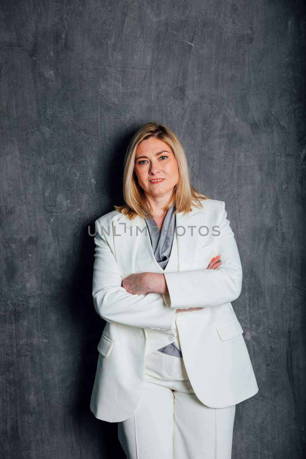 woman in white business suit