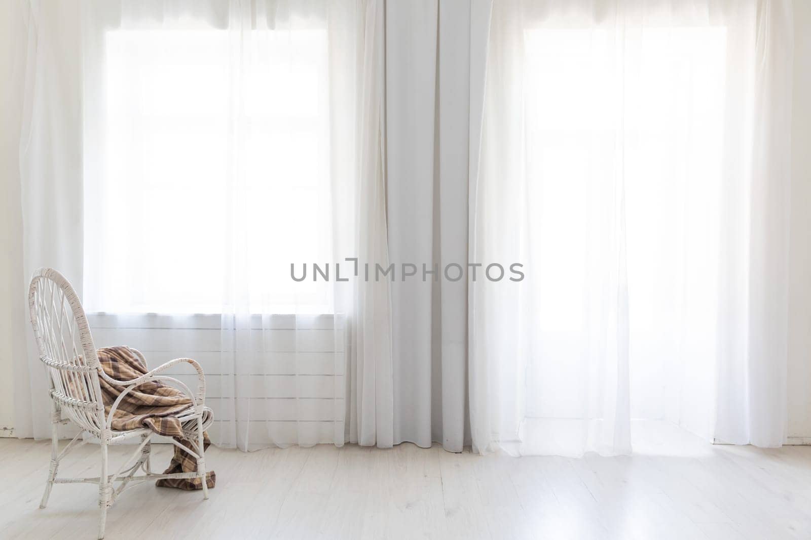 Vintage chair in empty white room interior