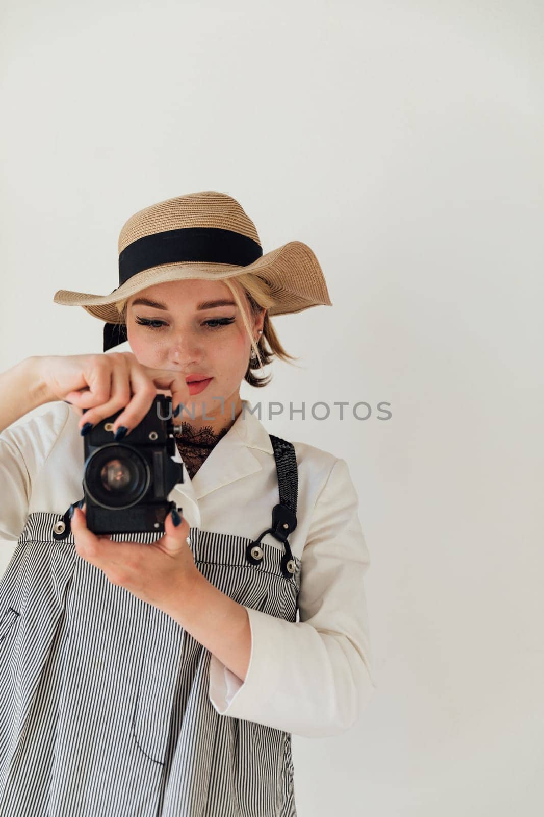 Female photographer taking photos film camera