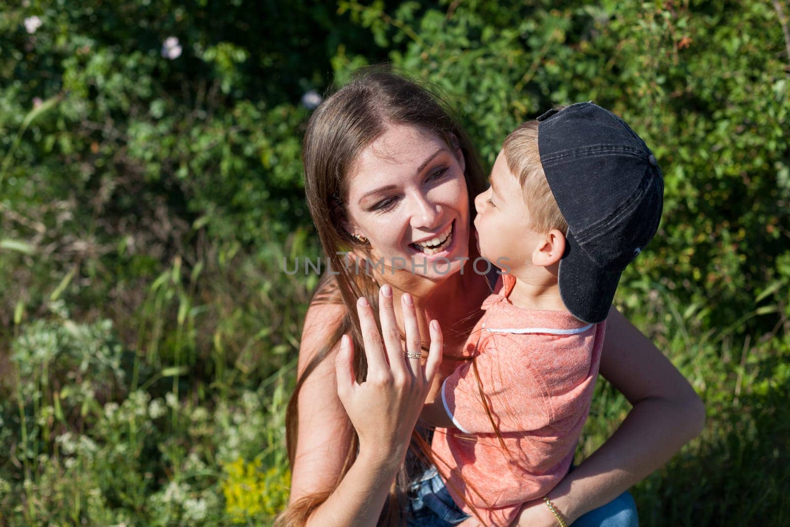 mom with her son on a picnic rest in nature