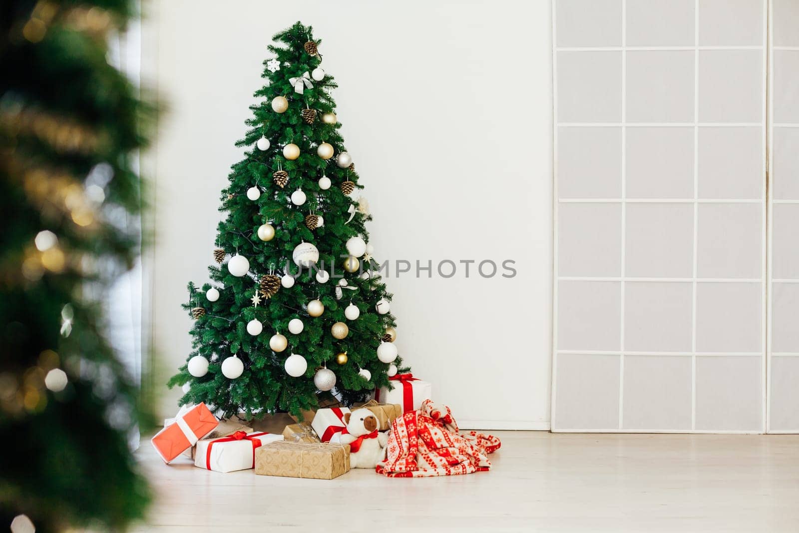 Christmas tree with gifts holiday new year interior decor as background by Simakov