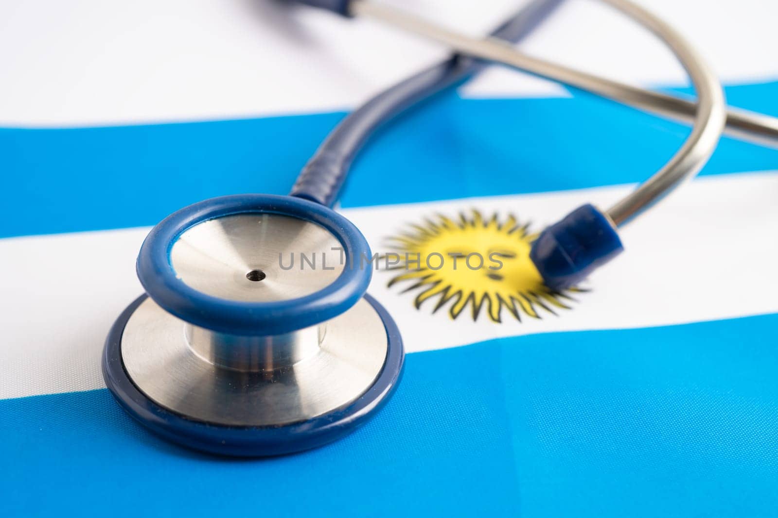 Stethoscope on Argentina flag background, Business and finance concept.
