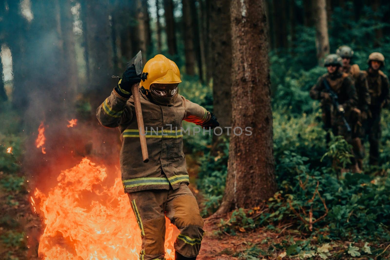 firefighter hero in action danger jumping over fire flame to rescue and save.