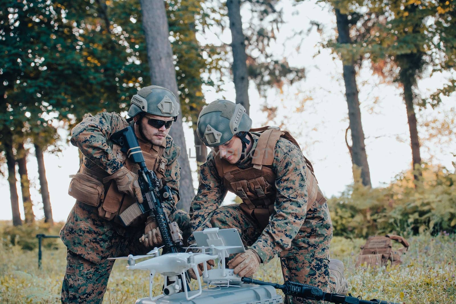 Modern Warfare Soldiers Squad are Using Drone for Scouting and Surveillance During Military Operation in the Forest. by dotshock