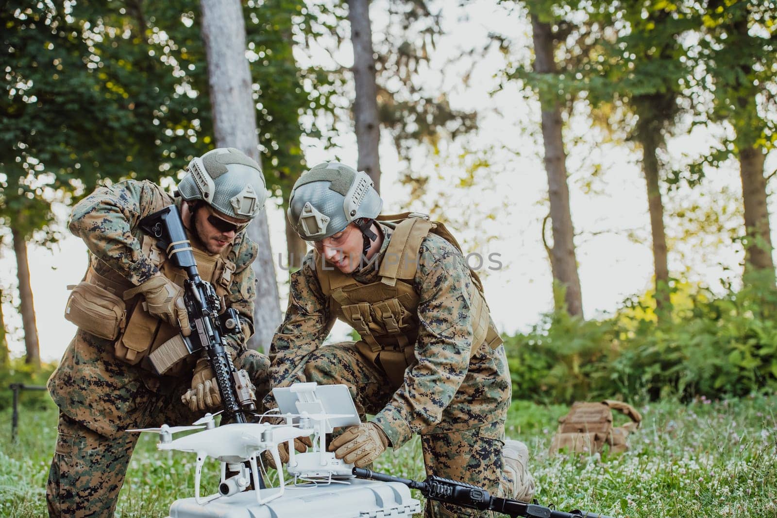 Modern Warfare Soldiers Squad are Using Drone for Scouting and Surveillance During Military Operation in the Forest. by dotshock