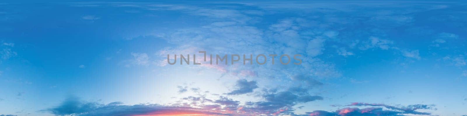 Bright sunset sky panorama with Cirrus clouds. Seamless hdr spherical equirectangular 360 panorama. Sky dome or zenith for 3D visualization, game and sky replacement for aerial drone 360 panoramas.