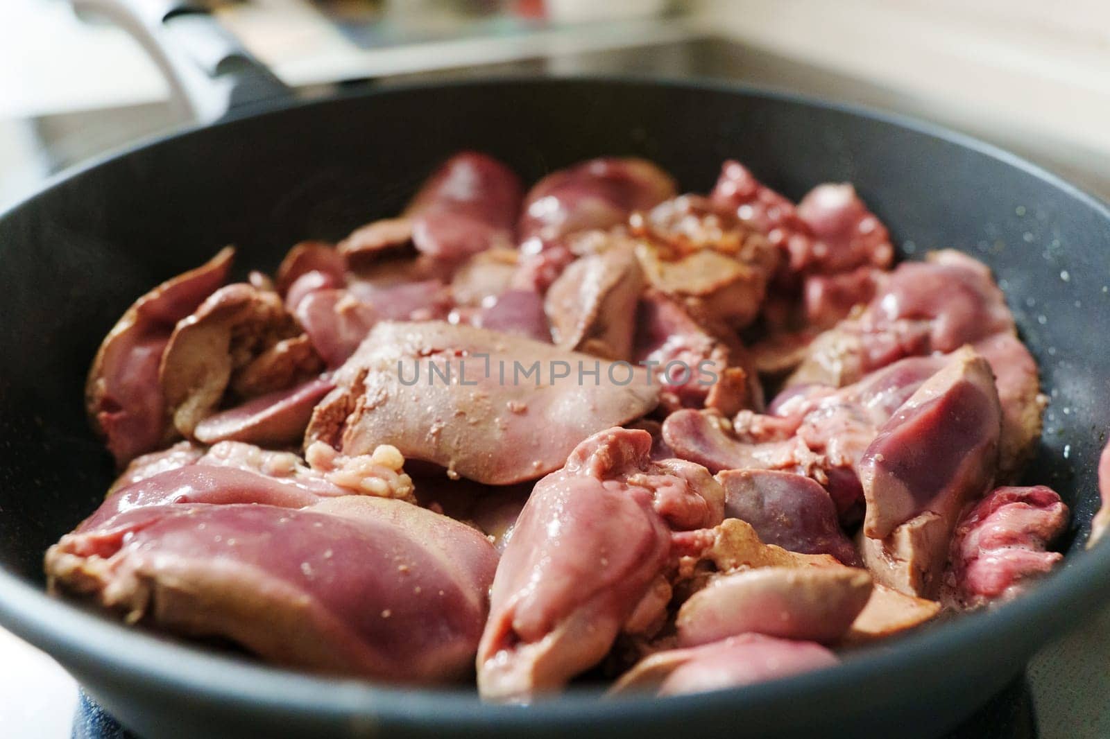 Succulent Chicken Liver Covered in Mouthwatering Sauce. Selective focus