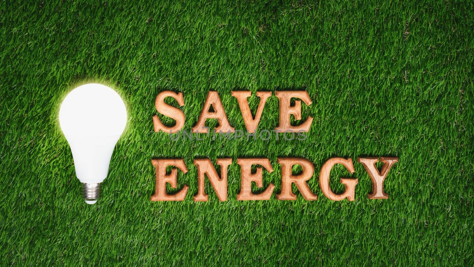 Eco awareness campaign message on grass background to reduce energy. Gyre by biancoblue