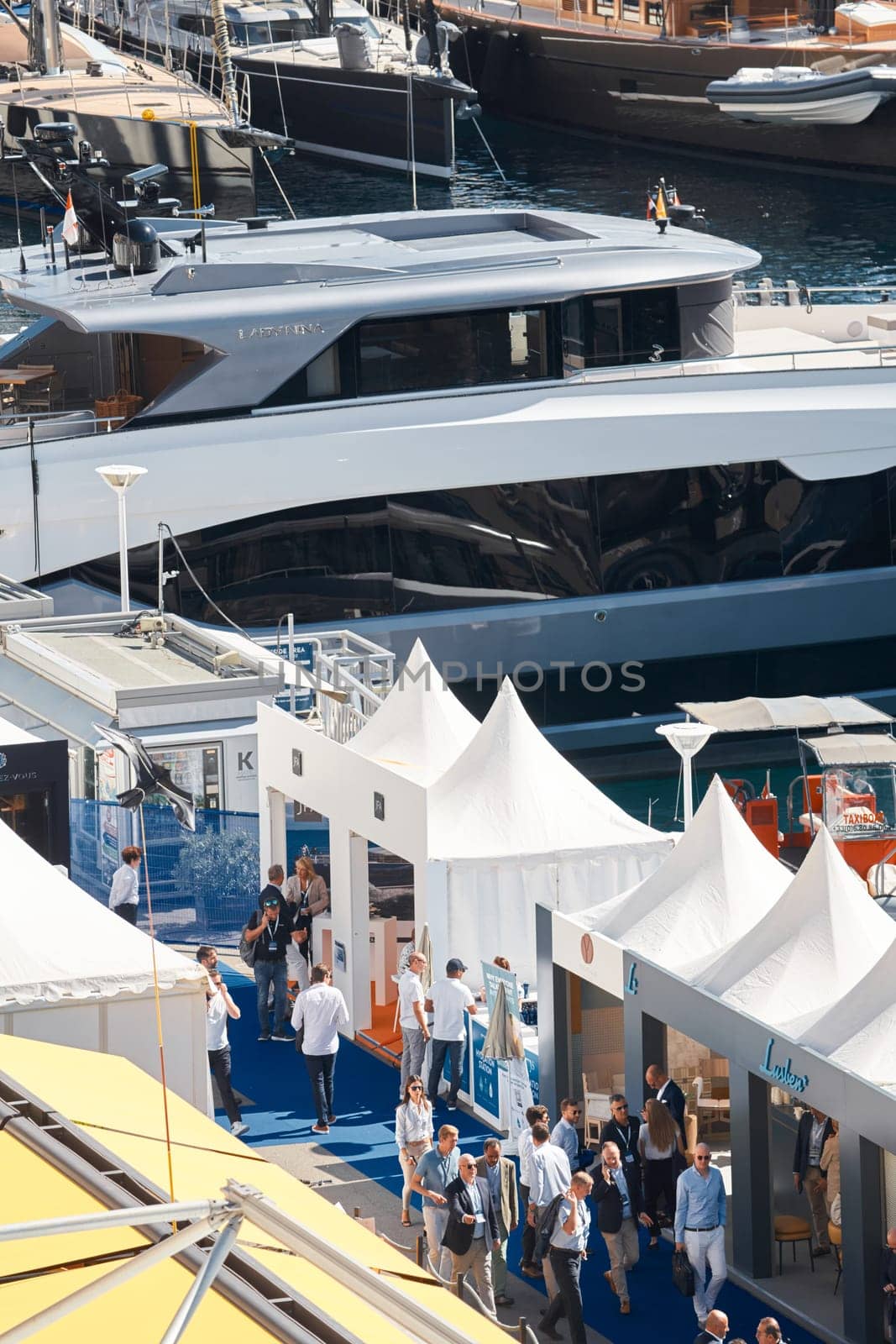 Monaco, Monte Carlo, 27 September 2022 - a lot of luxury yachts at the famous motorboat exhibition in the principality, the most expensive boats for the richest people around the world, yacht brokers. High quality photo