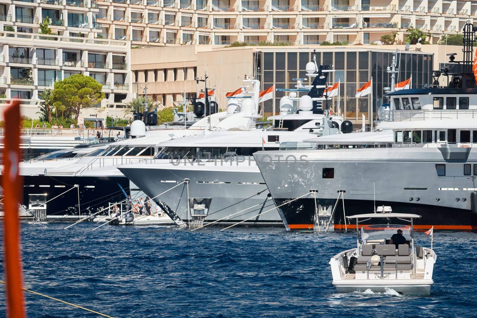 Monaco, Monte Carlo, 27 September 2022 - a lot of luxury yachts at the famous motorboat exhibition in the principality, the most expensive boats for the richest people around the world, yacht brokers. High quality photo