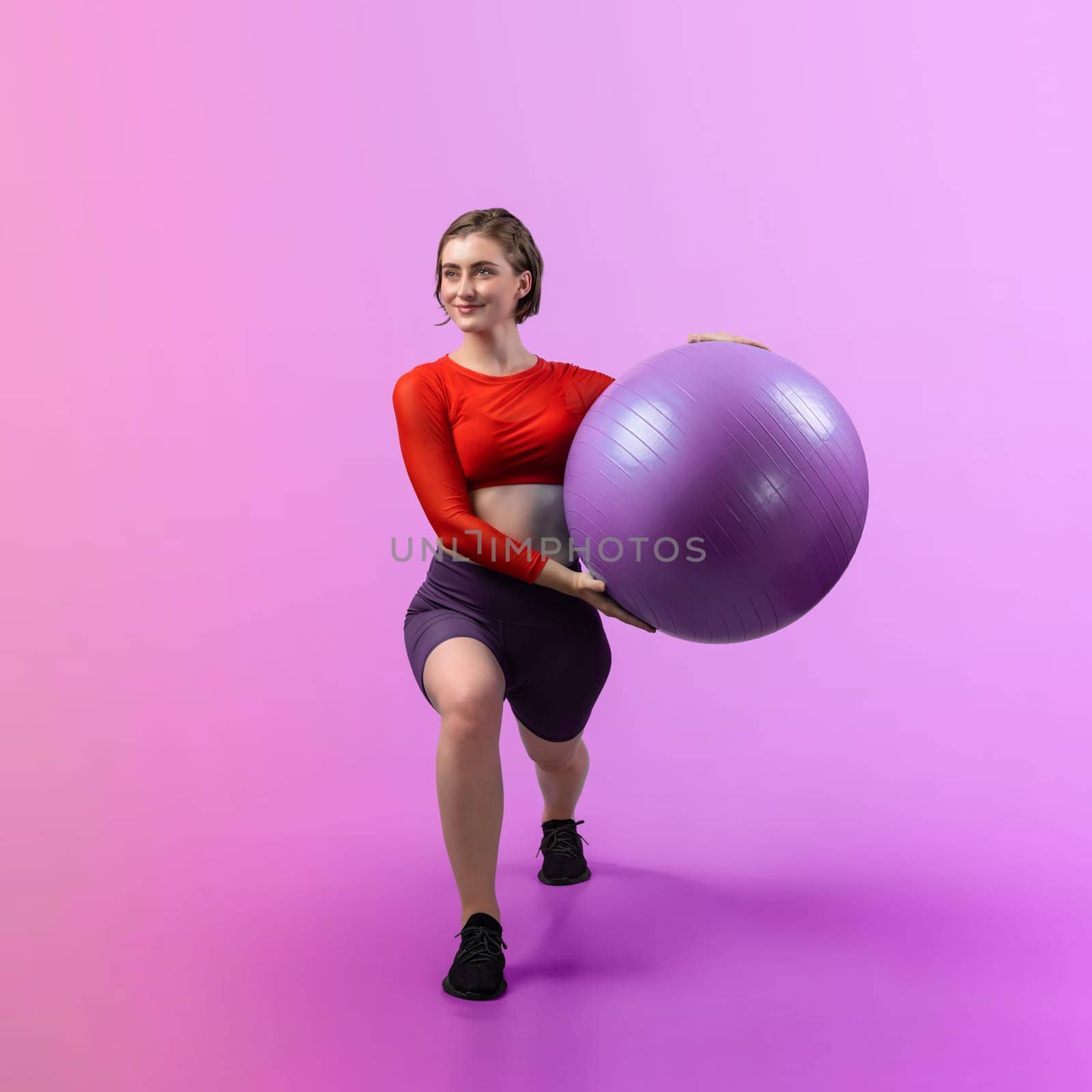 Full body length gaiety shot athletic and sporty young woman with fitness ball by biancoblue