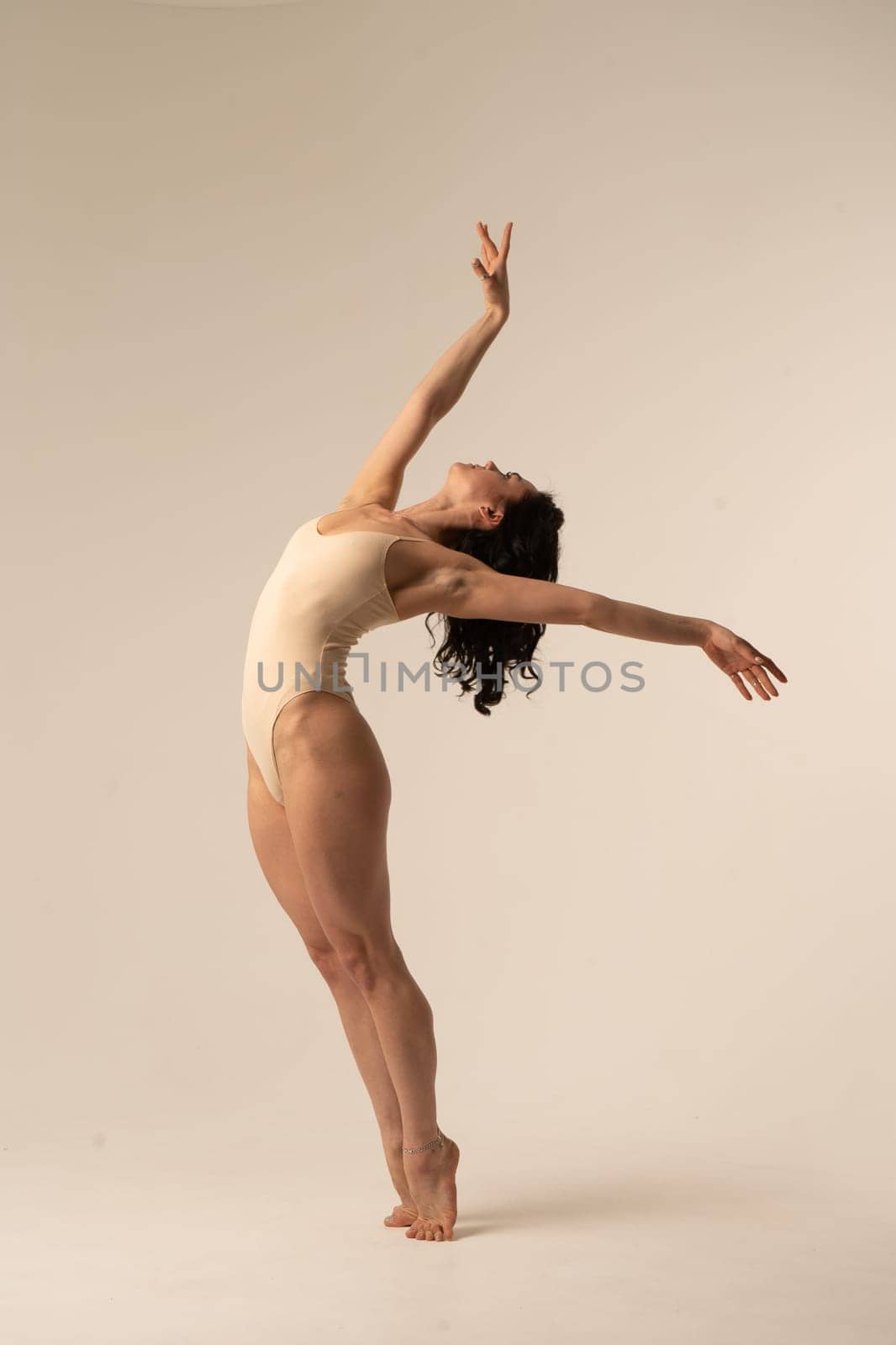 A woman jumping up in the air. High quality photo