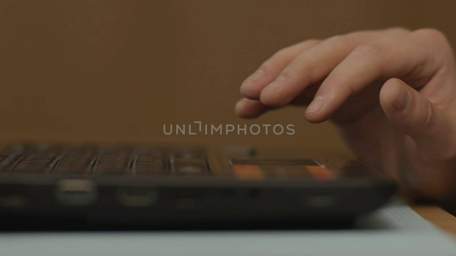 Close up of woman hand touching a tochpad on laptop. Close up of young businesswoman typing on computer laptop at the office or cafe 4K