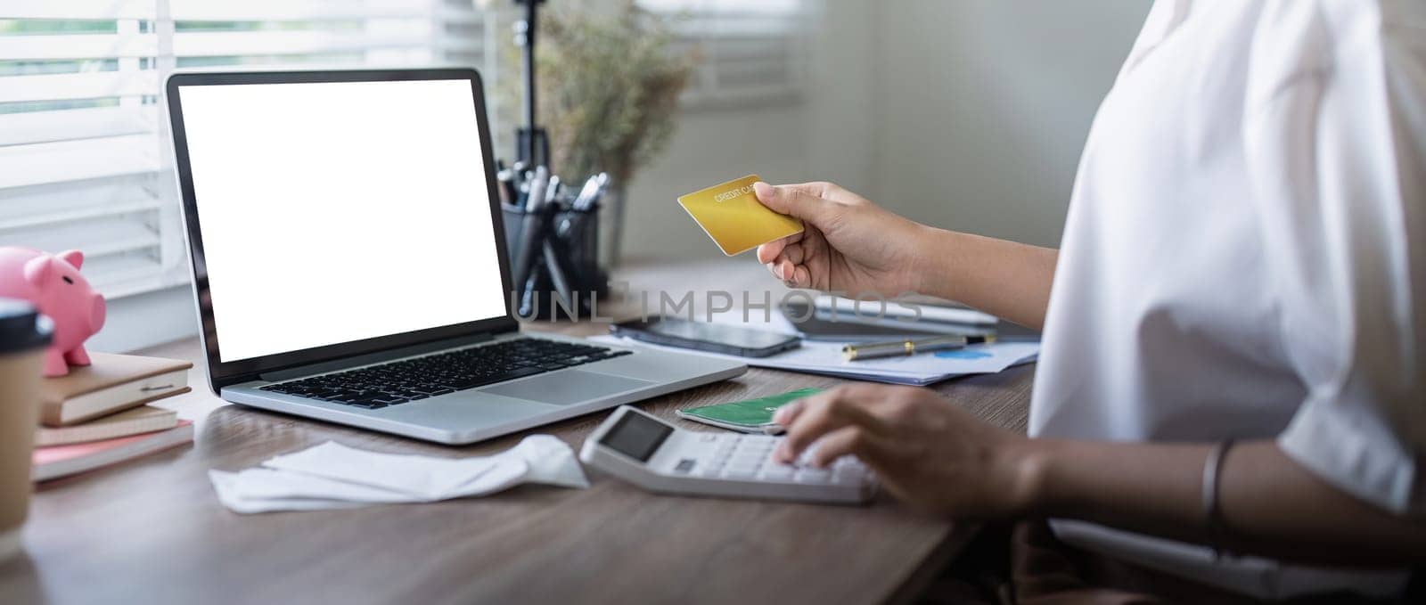 Credit card and laptop mockup for online payment, investment or savings insurance mock up. finance or woman on laptop blank screen.