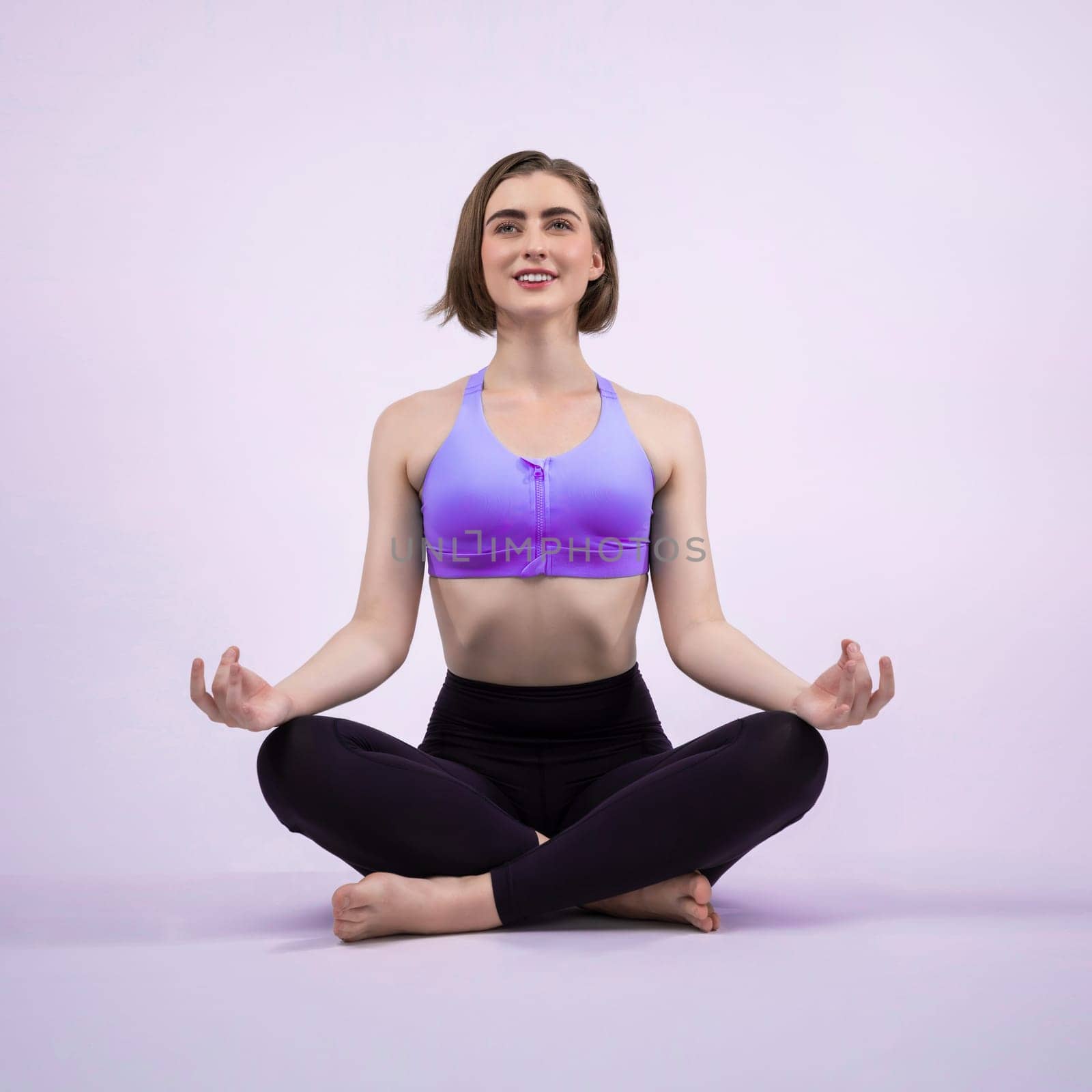 Full body length gaiety shot athletic and sporty woman doing healthy and meditative yoga exercise workout posture on isolated background. Healthy active and body care lifestyle