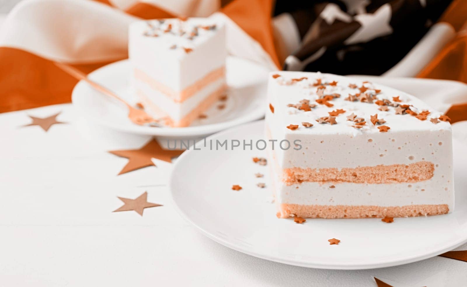 Color of the year 2024: Peach Fuzz. Fourth of july celebration. Sweet cake with usa flag colored sprinkles and stars , flag background