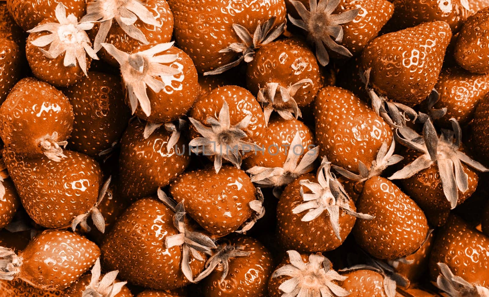 Color of the year 2024: Peach Fuzz. Fresh Yummy Strawberry texture Background. Organic summer fruit and berries, top view flat lay