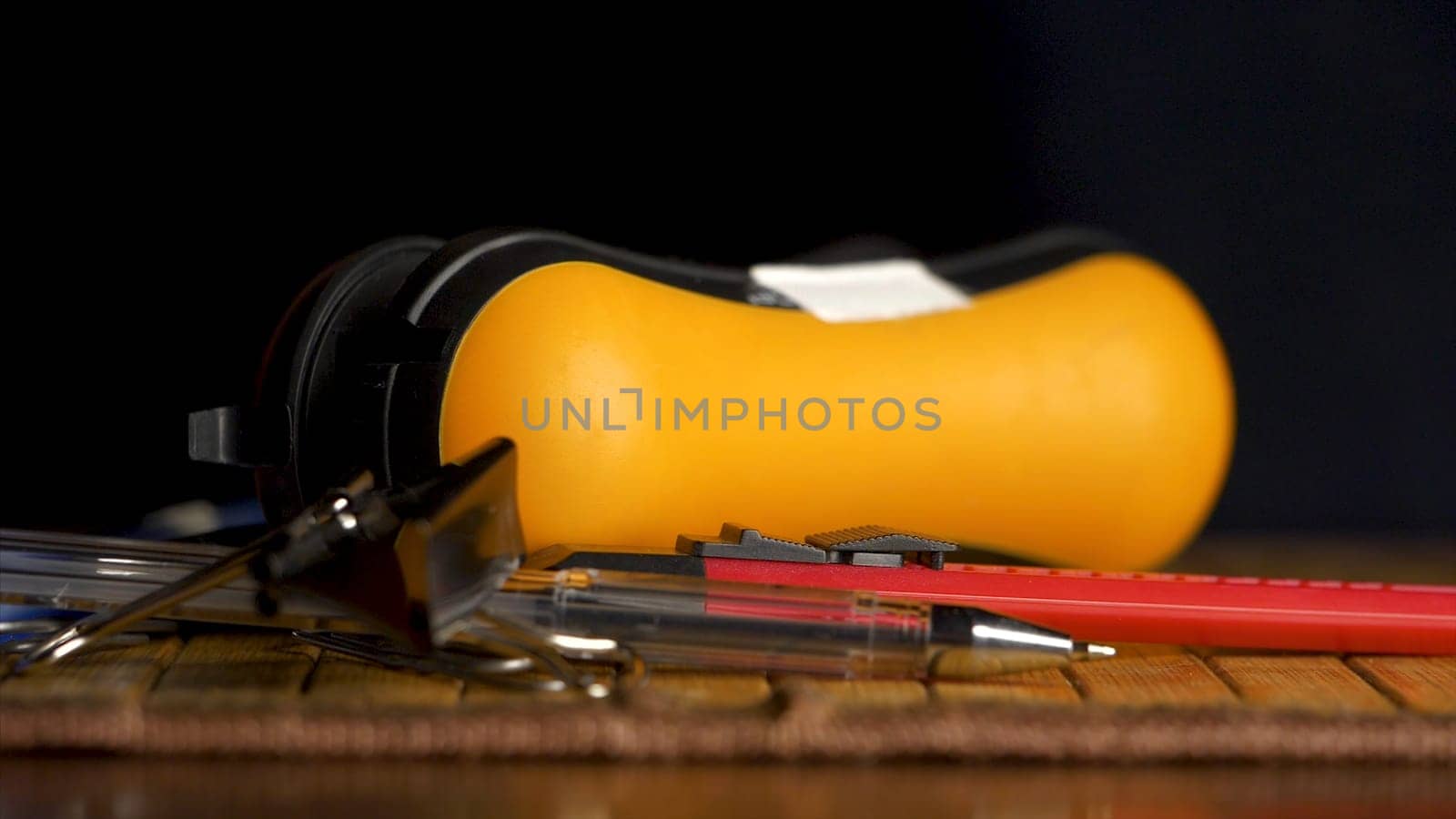 Office chancellery fall on black background. stapler, paper clip, pen, office, chancellery fall isolated on black background. Pen, pencil, ruler, stapler, stationery knife and paper clips isolated on black background. Office flat lay - work place concept background.